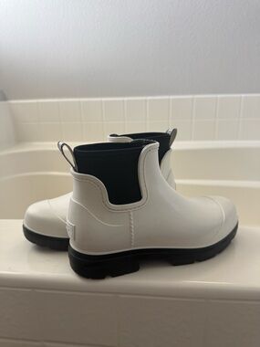UGG Black and White Slip-On Shearling Lined Shoe